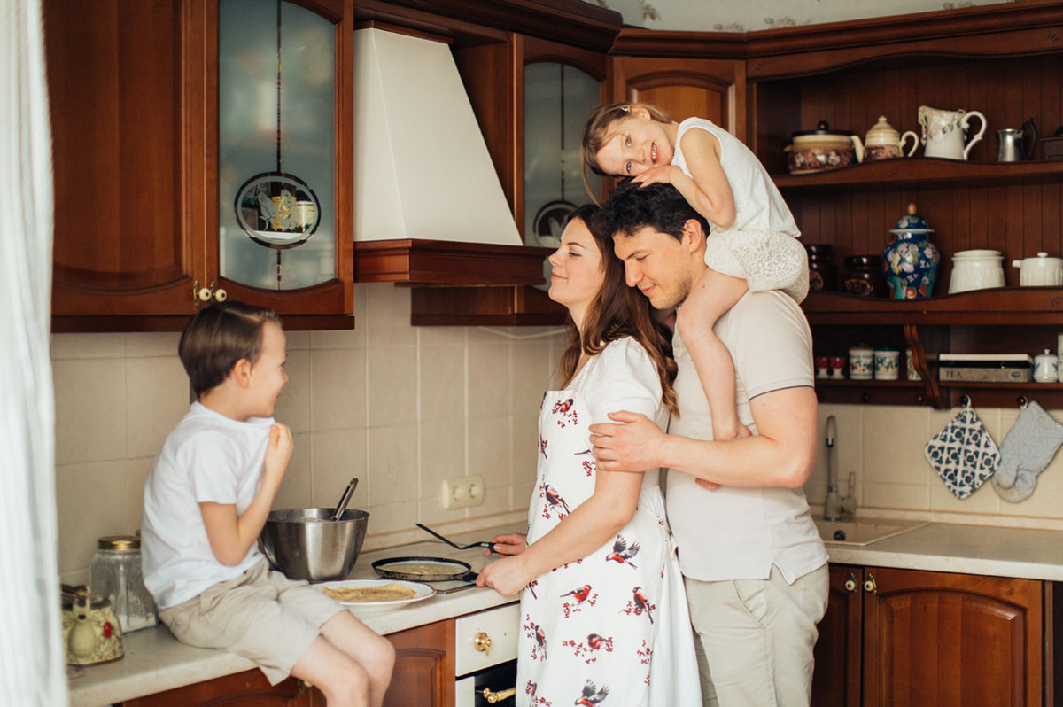 Parents and kids in a family-friendly kitchen