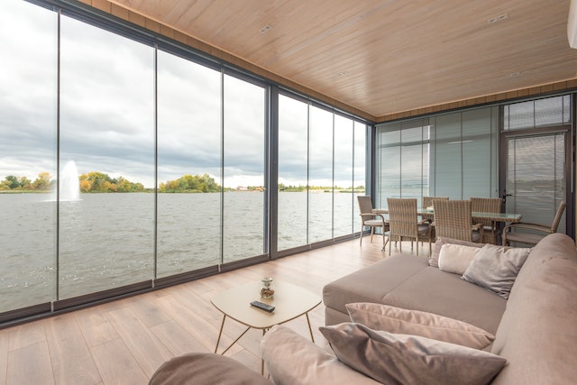 An interior of a contemporary house on a lake.